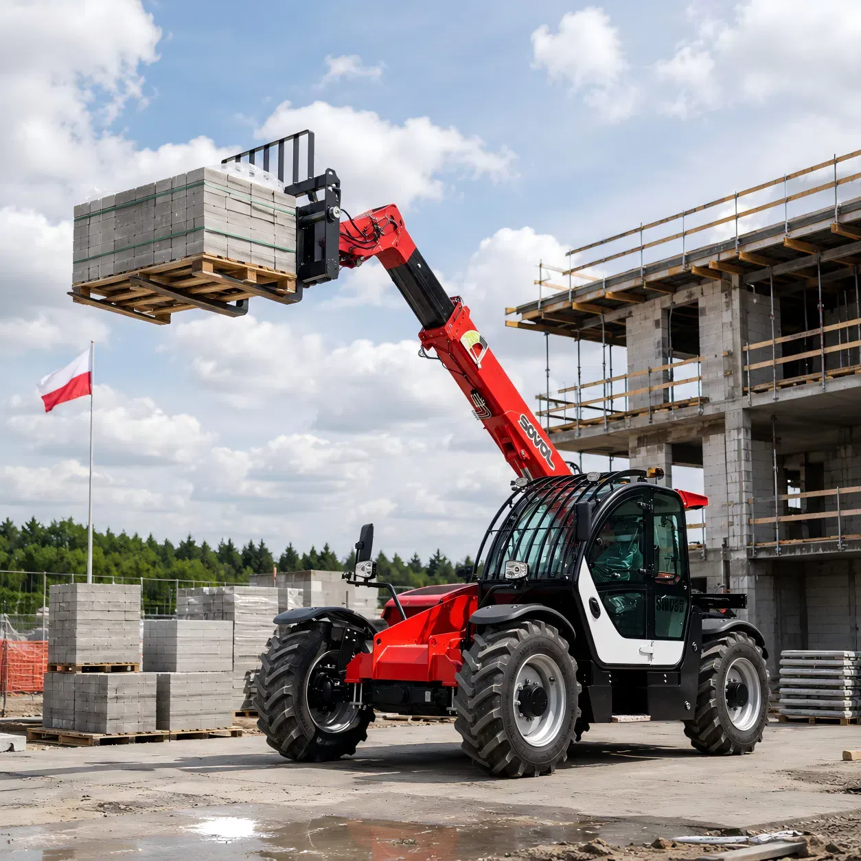 SOVOL telehandler handling palletized construction blocks on a building site in Poland